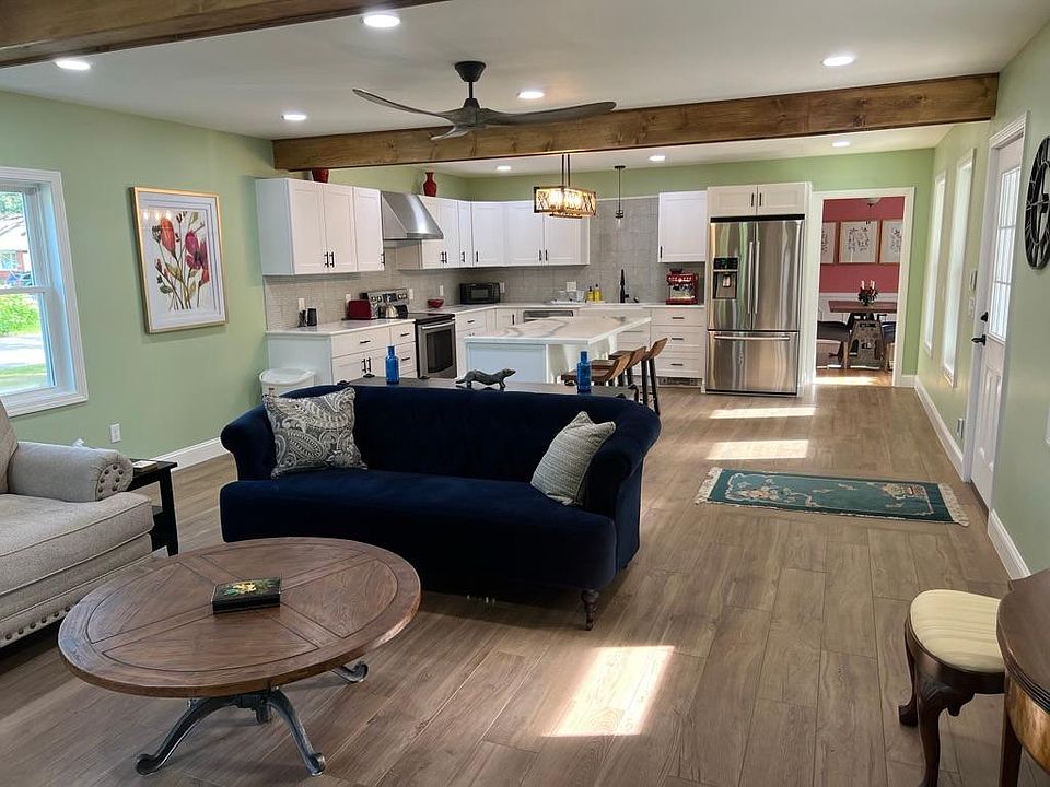 Bright, open family lounge area that open to the kitchen