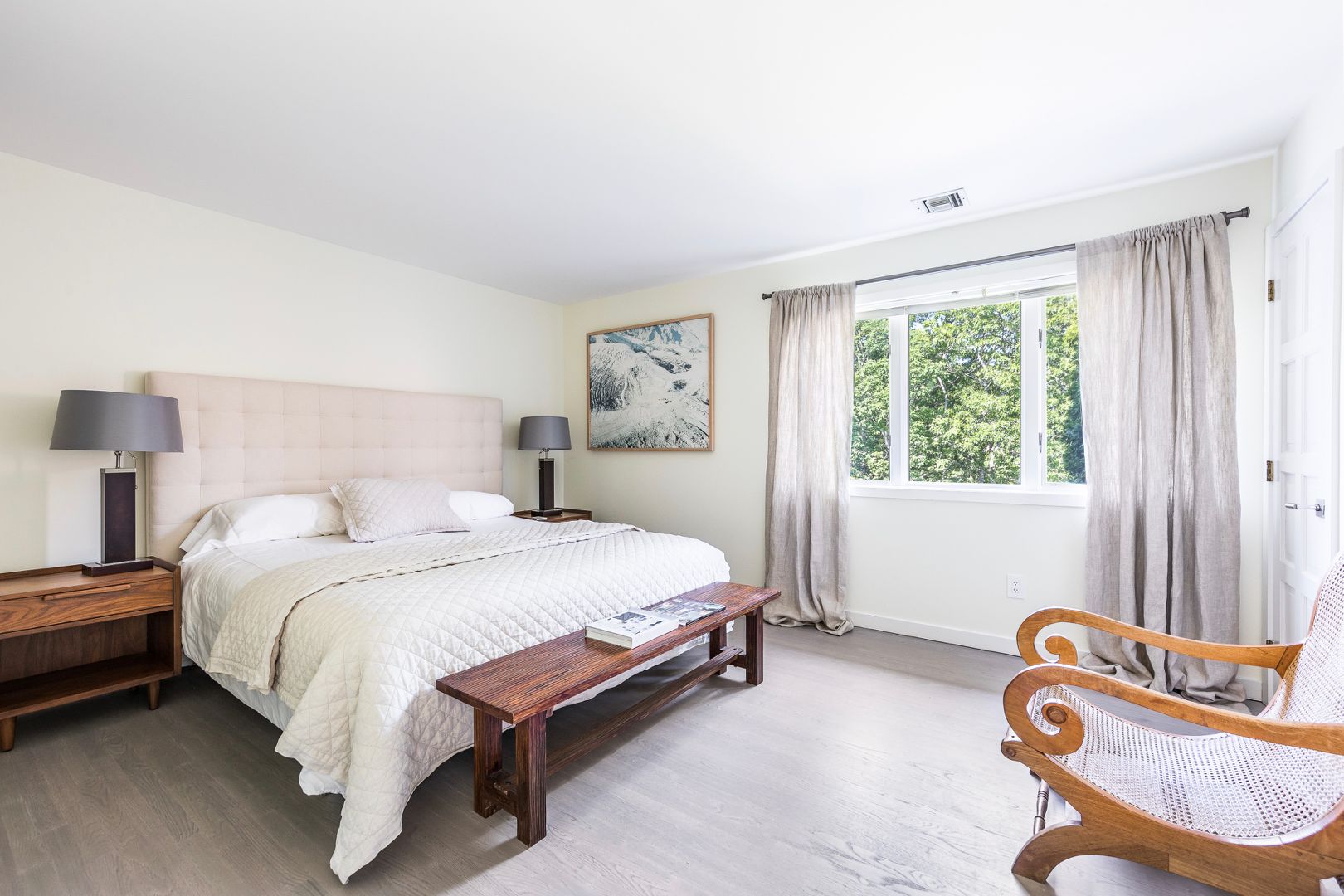  Guest bedroom outfitted with Restoration Hardware furniture, en-suite bathroom, closet.