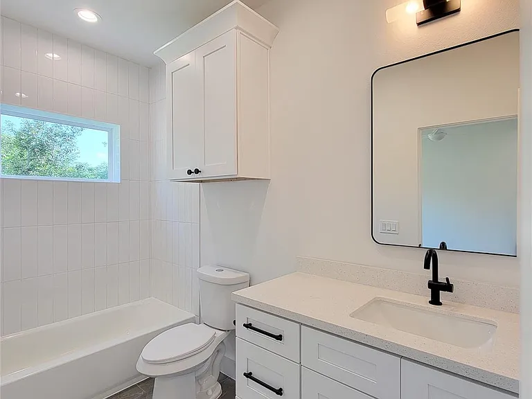 7705 Earl Rudder Way — Photo 32