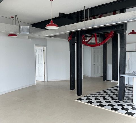 Unique apartment with a kitchen area and living room open layout!