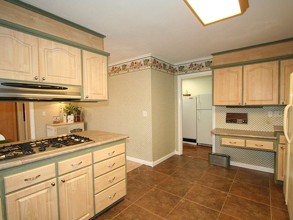 View of Kitchen w/walk-in Pantry