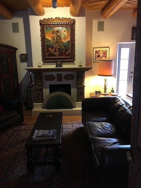 Library den with wood burning fireplace