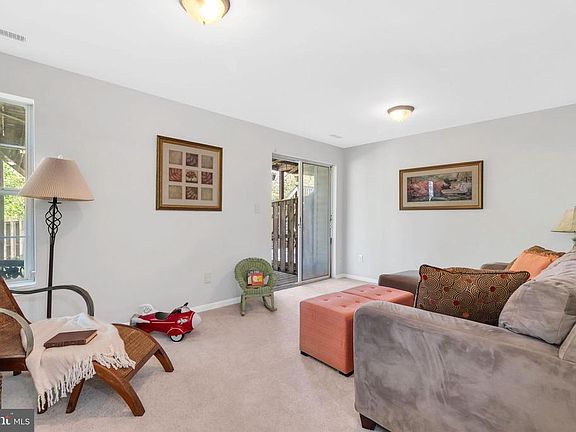 Lower level family room with walk out to rear