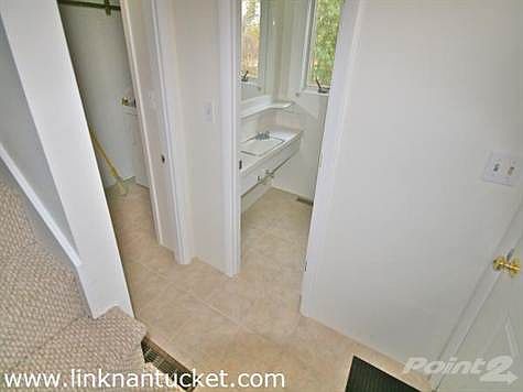 New tile in the entryway and bathroom.