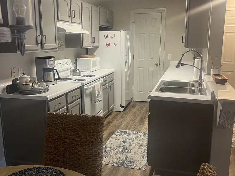 galley kitchen with large pantry