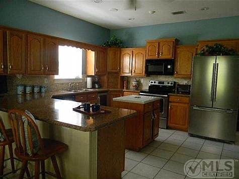 5th image of 7627 McClure Dr