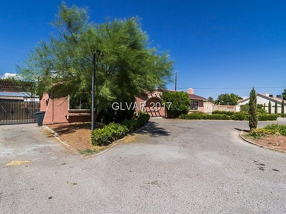 COVERED RV PARKING ON LEFT SIDE OF HOME W/ RV HOOKUP!