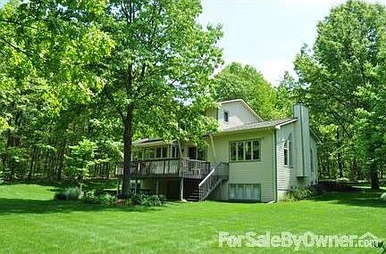 Large grassy yard : Lush carpet of thick grass with underground sprinkling system.