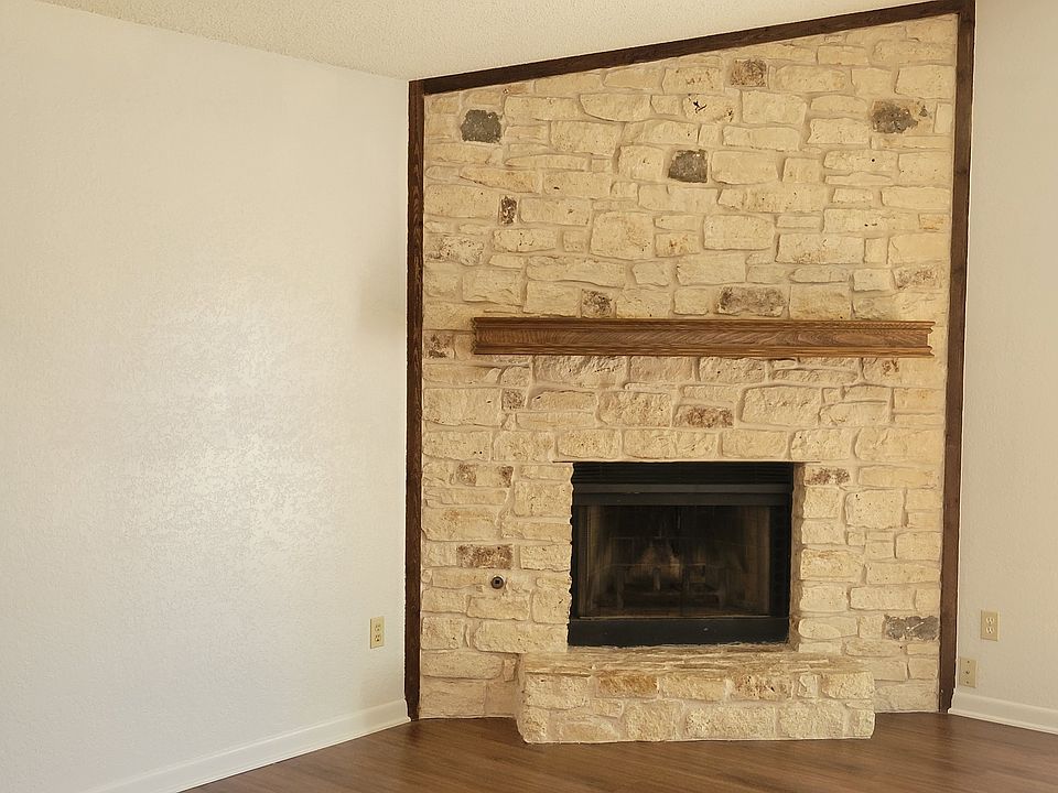 Corner wood-burning fireplace