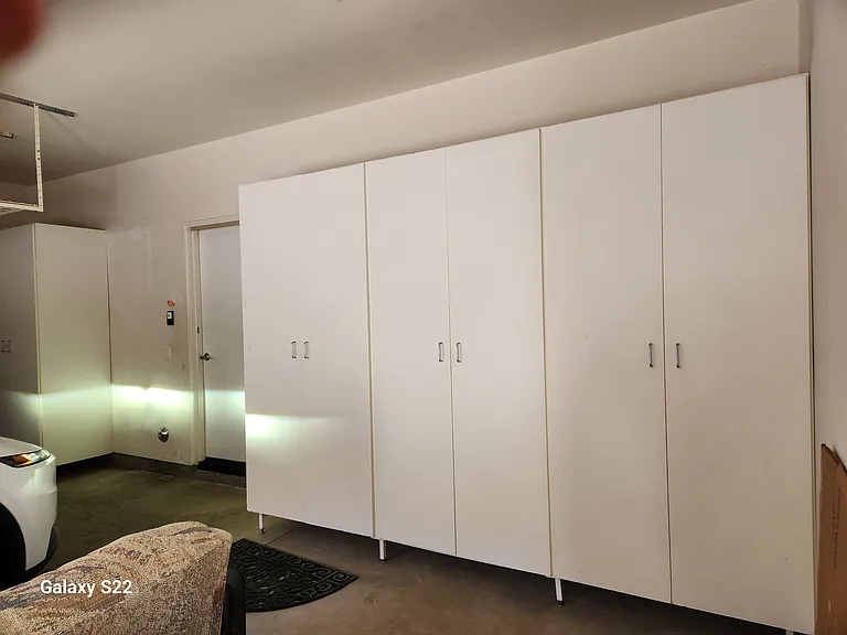Garage with additional storage cabinets