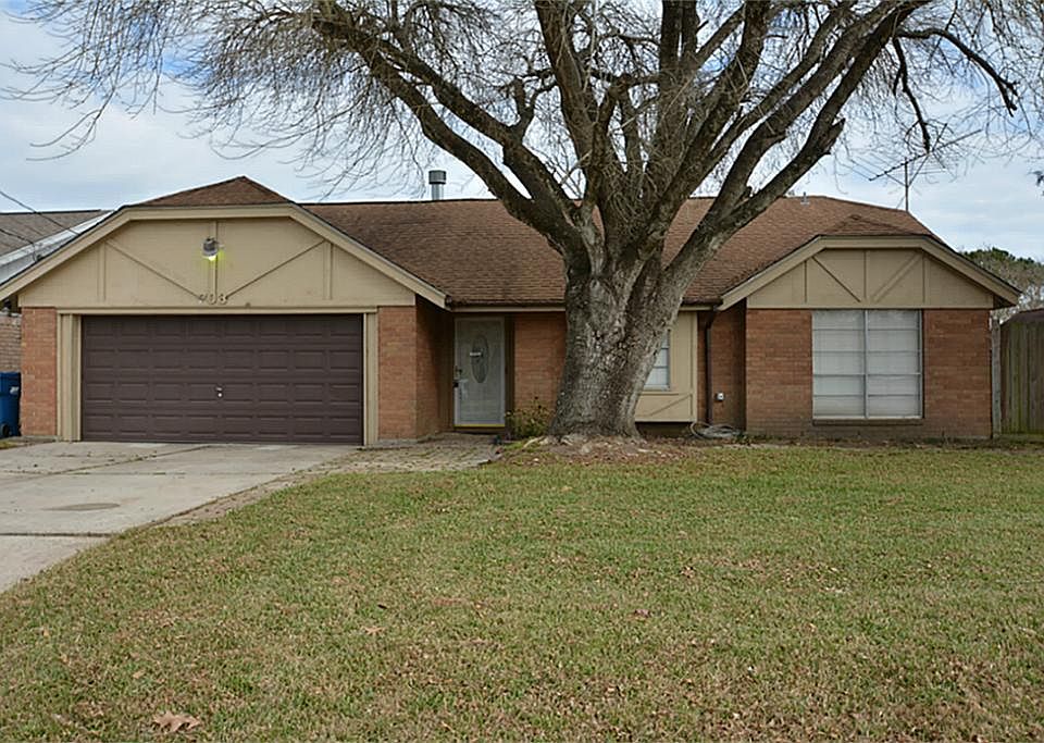 THREE BEDROOM, TWO FULL BATHS. DOUBLE CAR GARAGE ON TWO LOTS. OUTBUILDINGS.