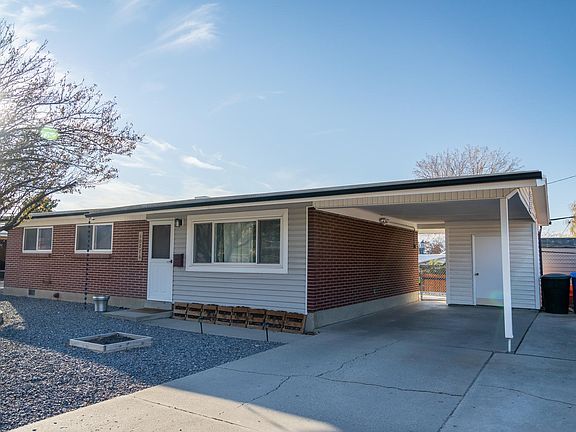 Carport, deep driveway & one of two sheds for use/access for tenant(s)