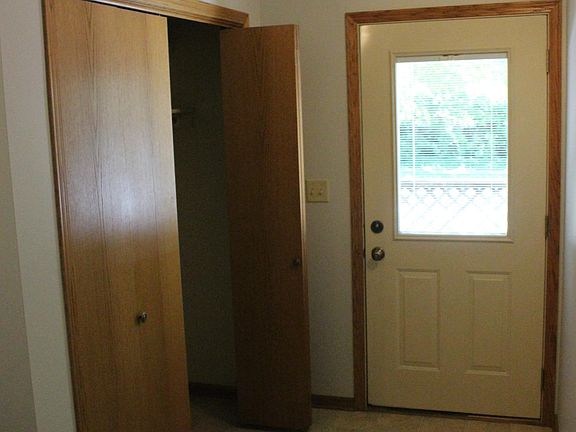 Spacious entry with convenient coat closet.