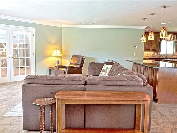 View from entry foyer to Living room and kitchen