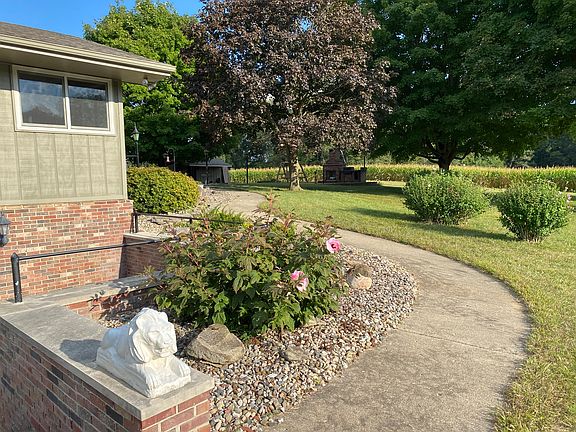 View from driveway to sidewalk to back door