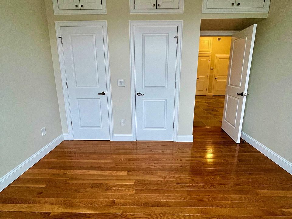 Bedroom 2 with Hardwood Flooring Double Closets and Over head storage. Lots of Natural Light. With Blackout Shades