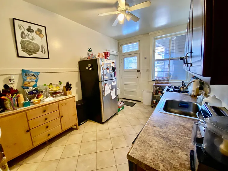 Kitchen opens to private back deck