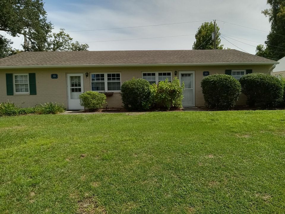 Duplex on right -- sitting on top of a little knoll overlooking Bradley Creek. Nothing but Bradley Creek to the left of the building!!!