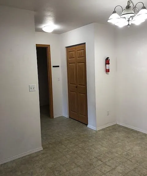 Dining area with hallway closet to adjoining laundry room & bonus room.