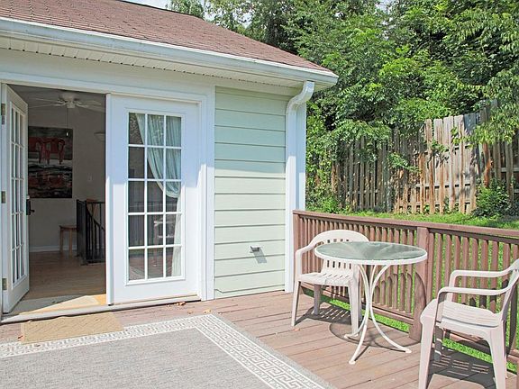 Front entry features a deck