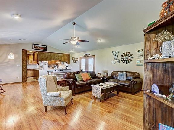 Open concept living is all the rage. The flow from kitchen to living is effortless and makes evenings a little more relaxing and invites conversation.