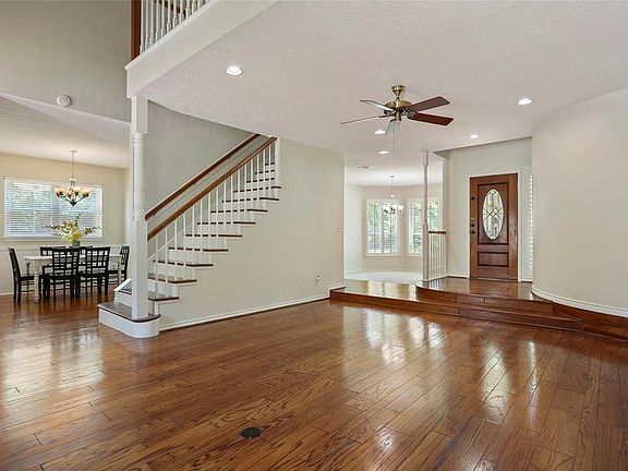 These beautiful, real hardwood floors extend up the stairs, thru to the breakfast room and kitchen.