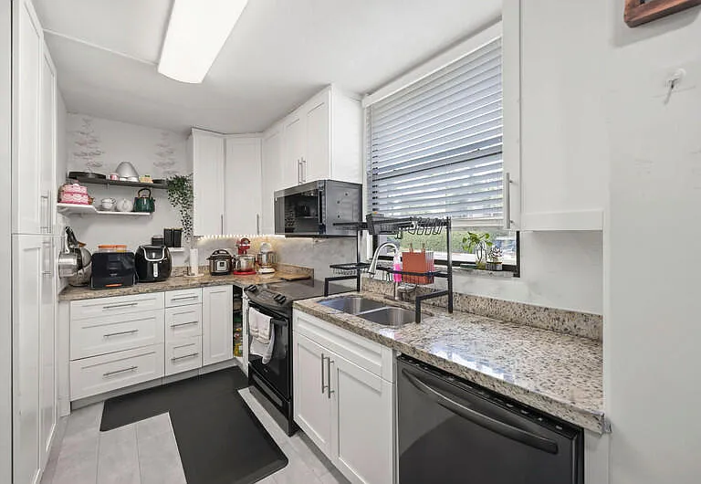 8421 Forest Hills Dr #104 — Photo 2