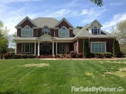 Front view of House
						:
						House sits on an acre lot, it fronts Walker Valley Road.