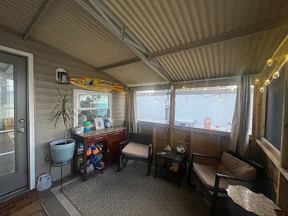 Back porch leads to patio