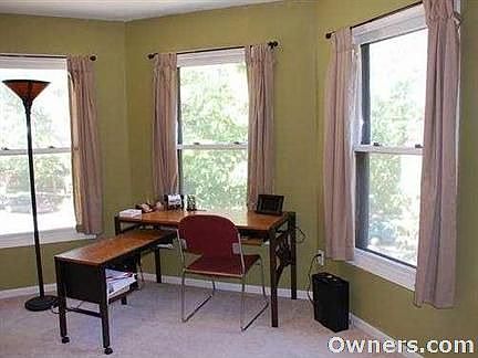bedroom or office overlooking city skyline