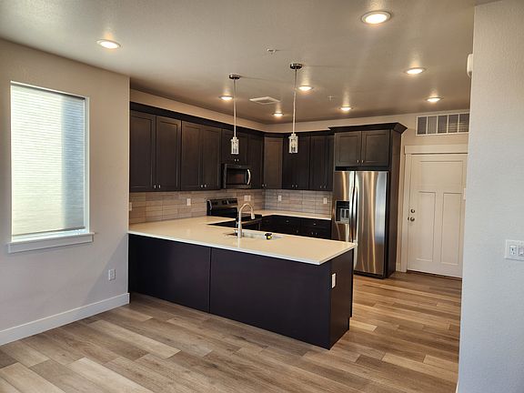 Walk into living room and huge kitchen