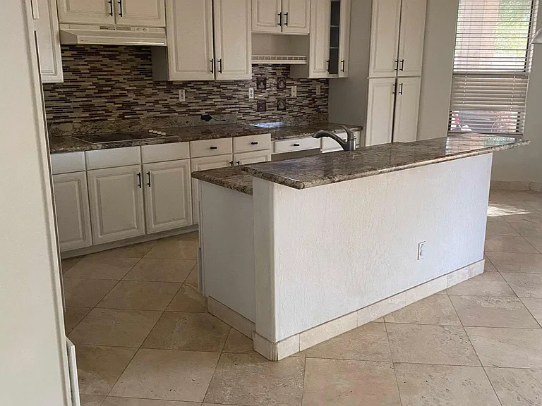 Kitchen with upgraded counter tops and stainless Steel Appliance