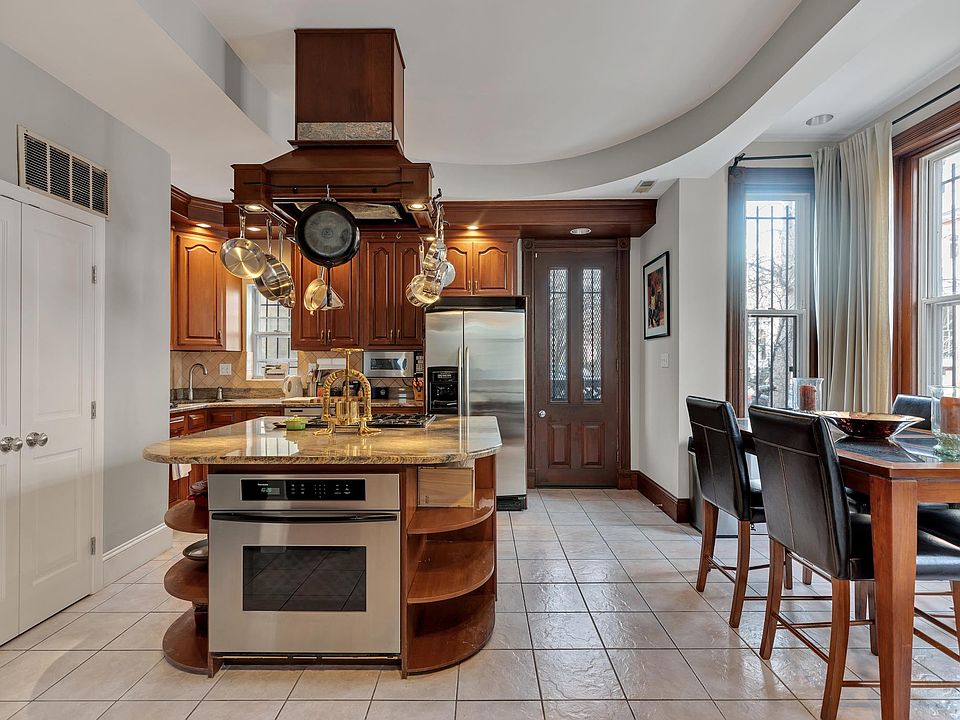 Large eat-in kitchen, gas range, convection oven and lots of windows.