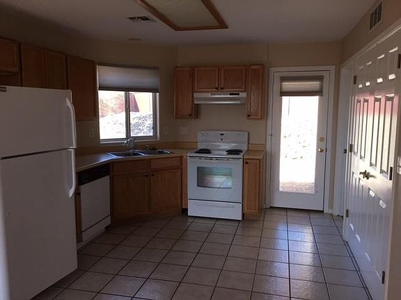 Kitchen, back door, laundry doors on right