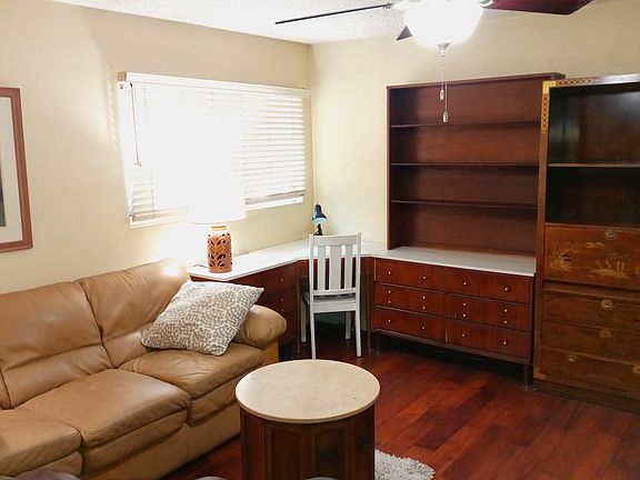 Corner desk with ample shelving and drawers