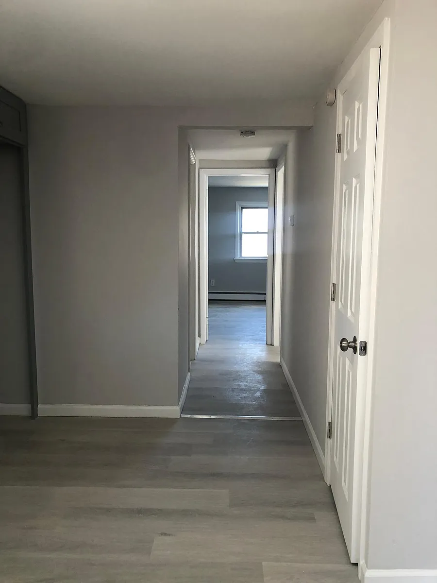 Hallway facing bedroom 1 - 945 E 25th St #2