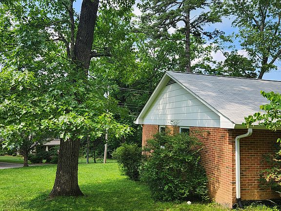 View of quiet street from side of backyard