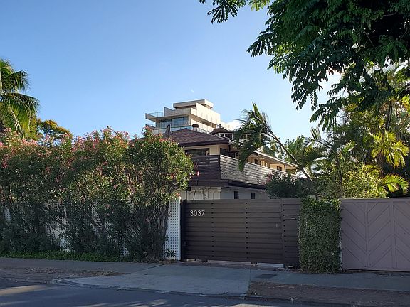 Separate, secure, remote-controlled gated entrance with driveway for secure parking of up to 2 cars