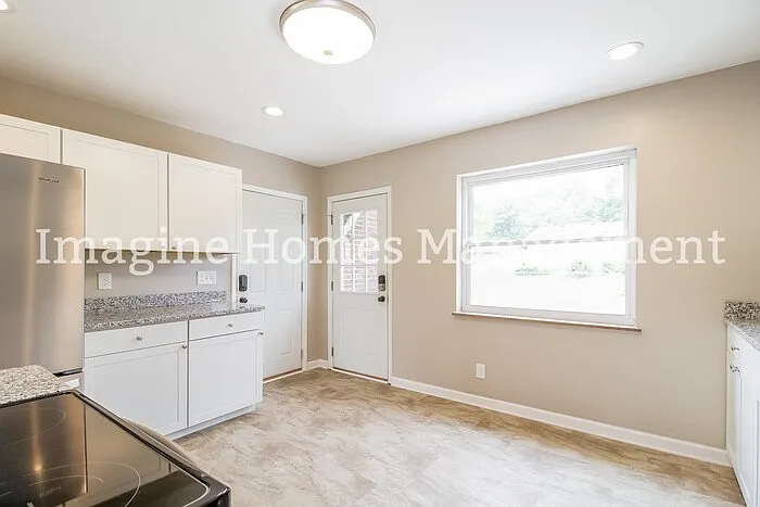 8587 Kenwood Rd — Photo 6