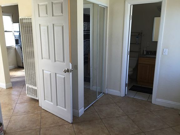5th image of 9519 S San Pedro St