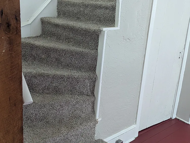 Dining room, toward stairs leading to 2nd floor