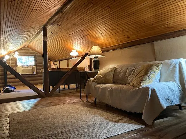 Loft with large desk and futon