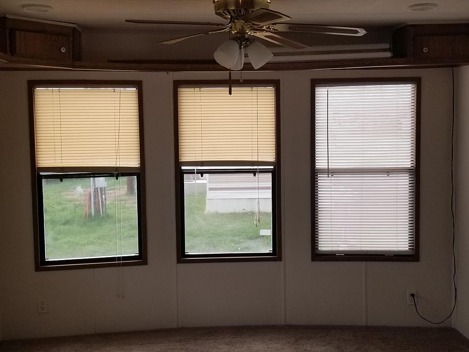 Ceiling fans in front room and bedroom.