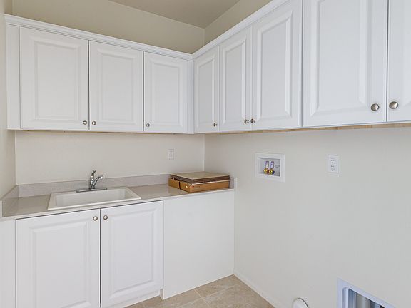 Laundry room with cabinetry
