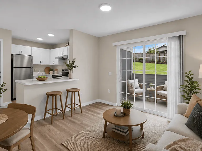 Staged apartment living room and dining area with breakfast bar, modern kitchen, private patio access, and contemporary furnishings. Staged apartment living room and dining area with breakfast bar, modern kitchen, private patio access, and contemporary fu