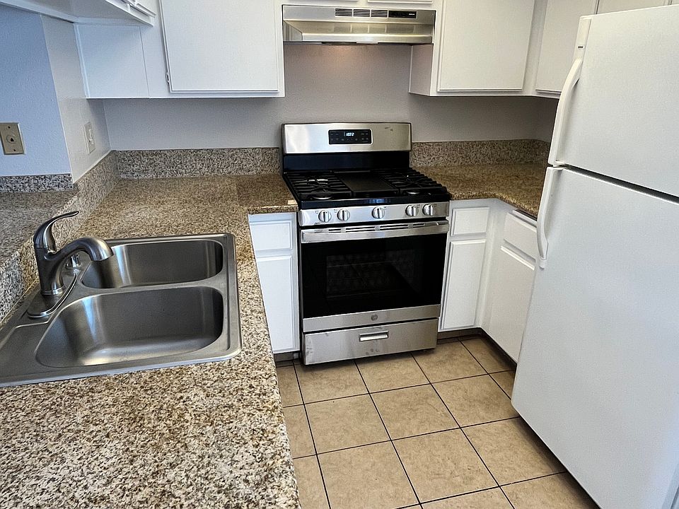 Renovated kitchen, with granite countertops & stainless steel appliances