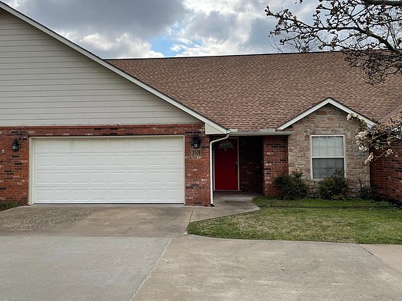 Street view of garage and front entry