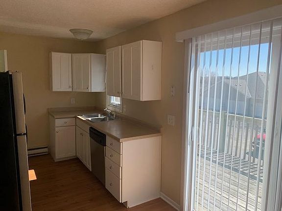 Kitchen and patio door to large deck