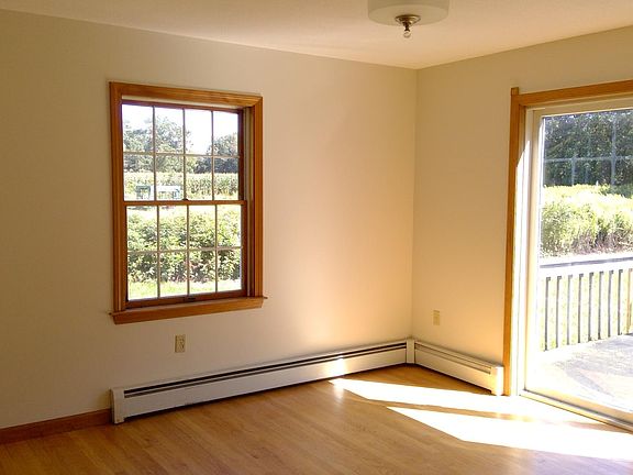 Dining room with sliders to large back deck.