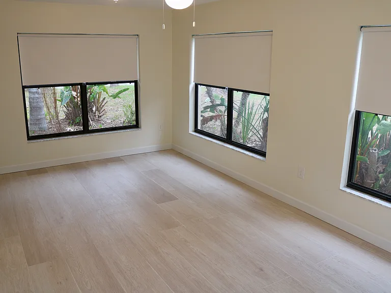 Custom blinds throughout the house. Blackout quality. Easy maintenance tile floors. Ceiling fans and well lit.